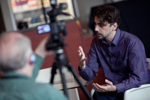 man talking on camera