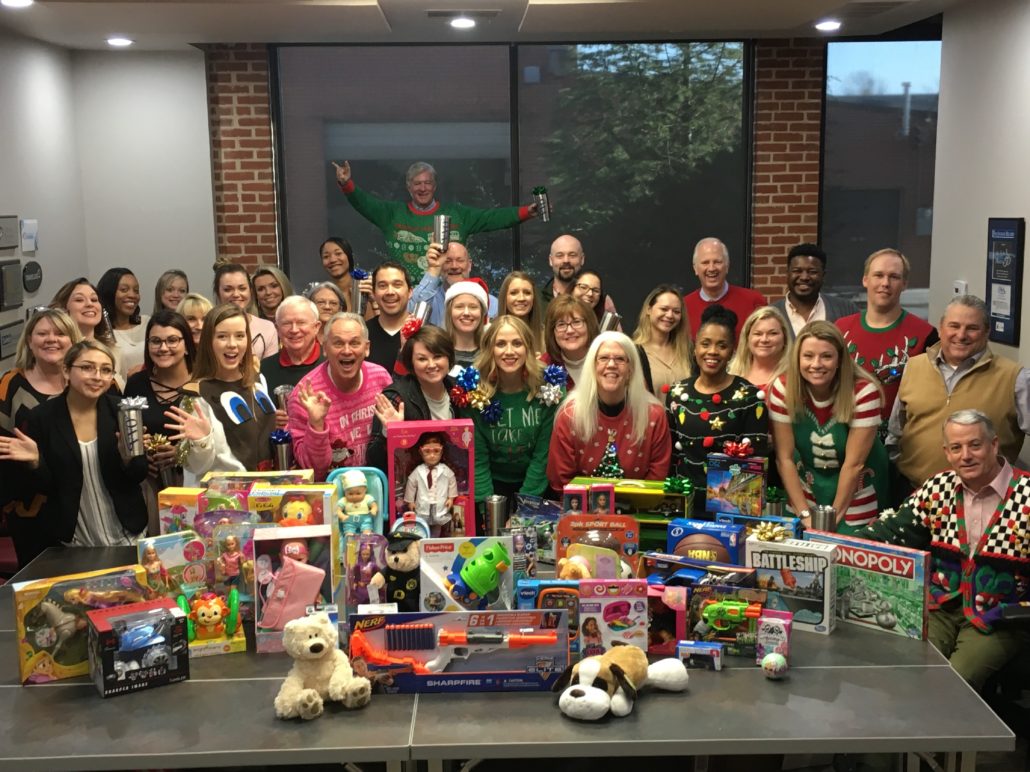oaa staff with toys for toy drive